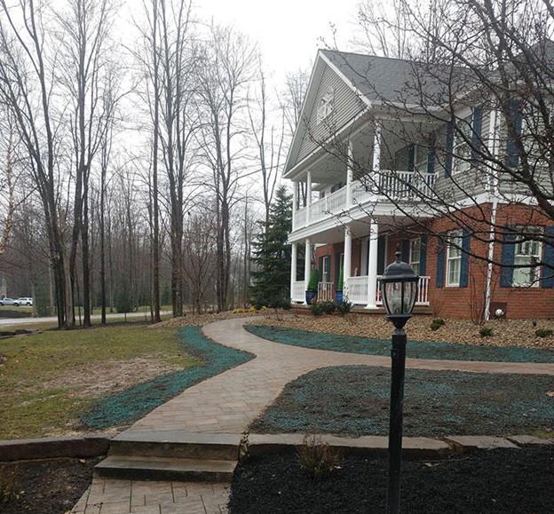 Use stone or river rock for front yard landscaping in Northeast Ohio