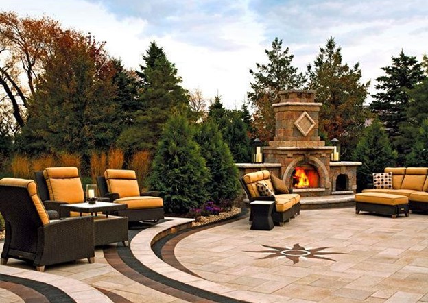 Outdoor entertainment area with fireplace