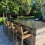 outdoor bar seating area in outdoor kitchen